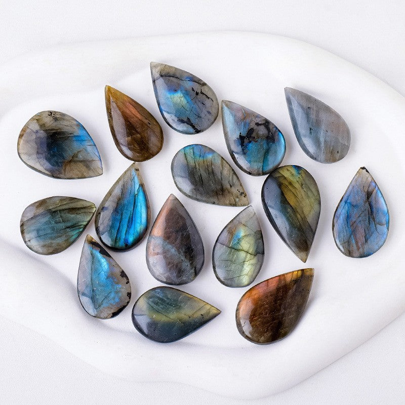 Natural Crystal Blue Light Elongates Stone Droplets