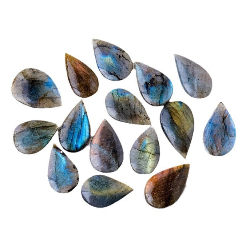 Natural Crystal Blue Light Elongates Stone Droplets