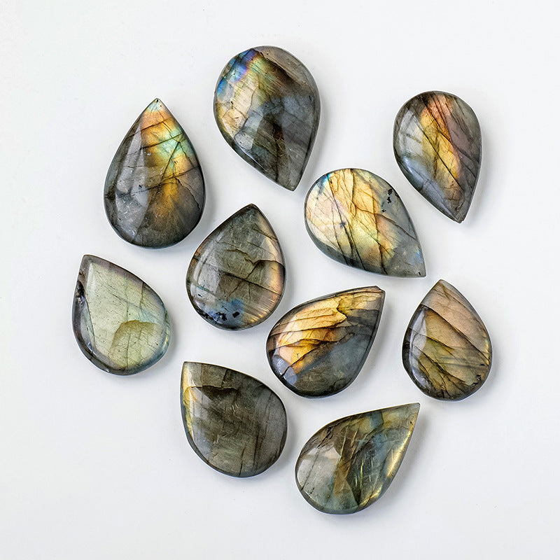 Natural Crystal Blue Light Elongates Stone Droplets